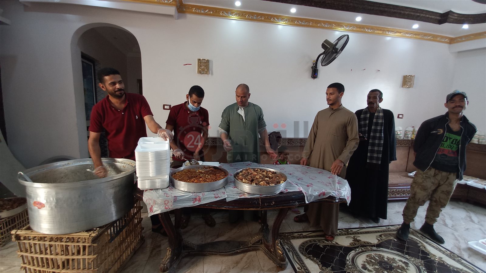 تجهيز وجبات للصائمين الأكثر احتياجا والأرامل بمركز ديروط- تصوير إيمان سمير