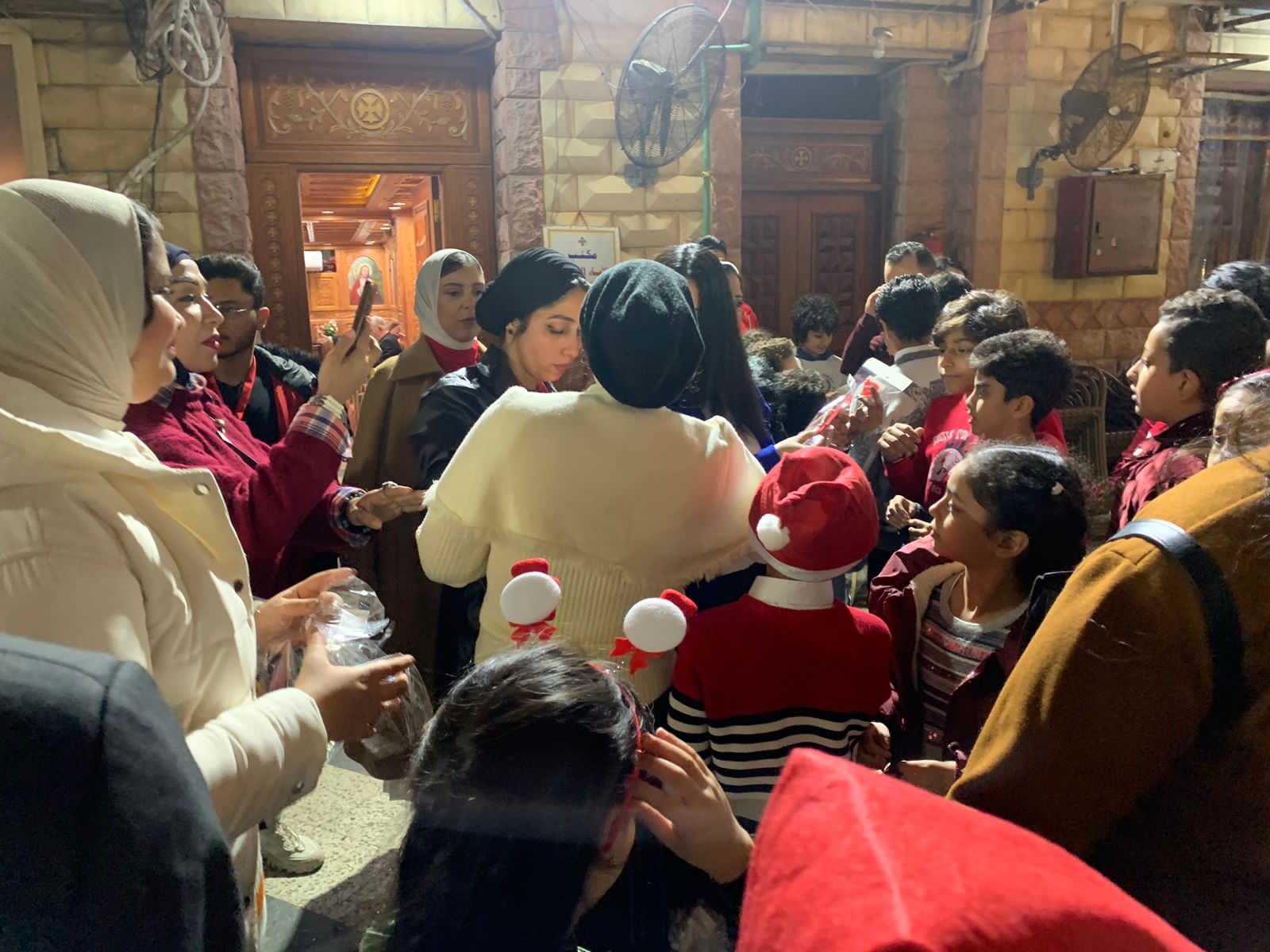 التحالف الوطني يوزع هدايا لاسعاد الصغار في عيد الميلاد ببورسعيد