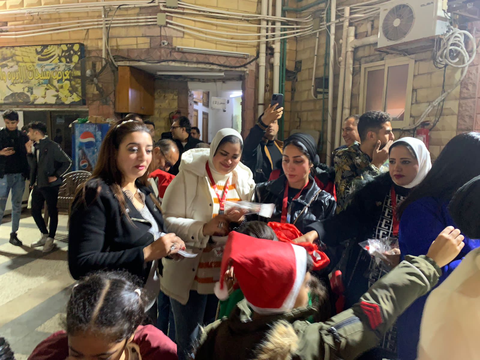 التحالف الوطني يوزع هدايا لاسعاد الصغار في عيد الميلاد ببورسعيد