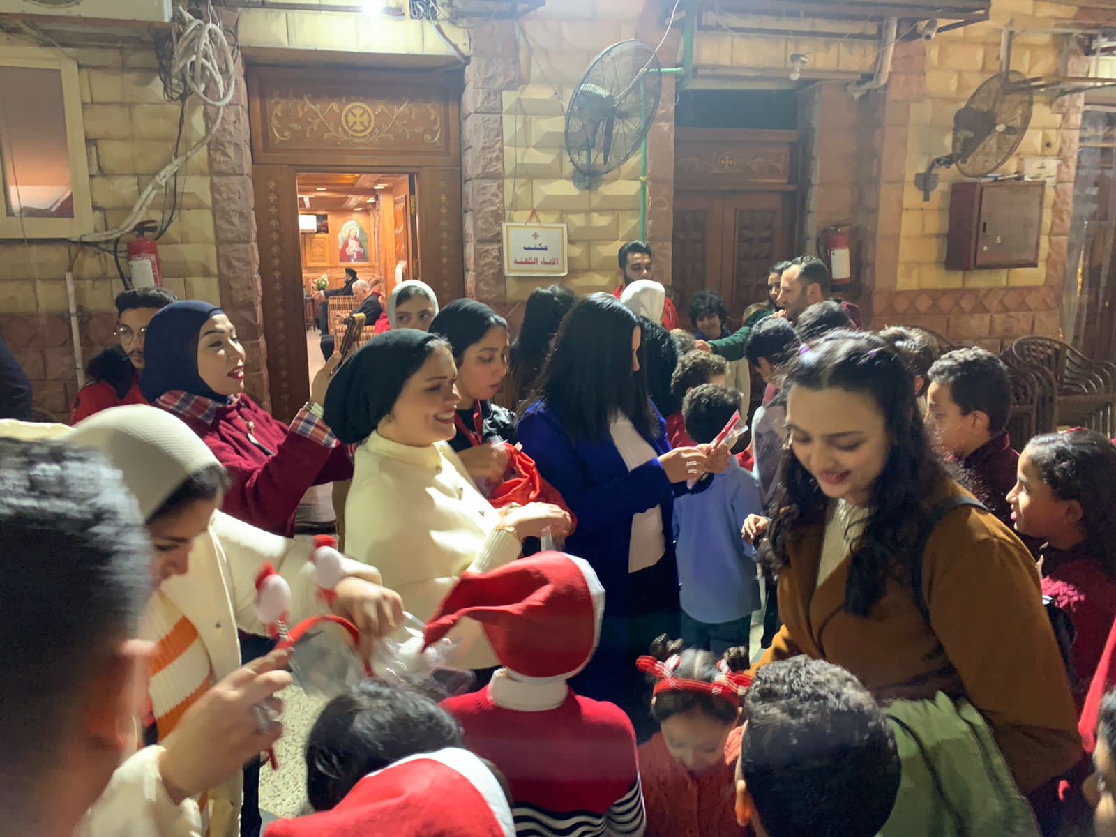 التحالف الوطني يوزع هدايا لاسعاد الصغار في عيد الميلاد ببورسعيد