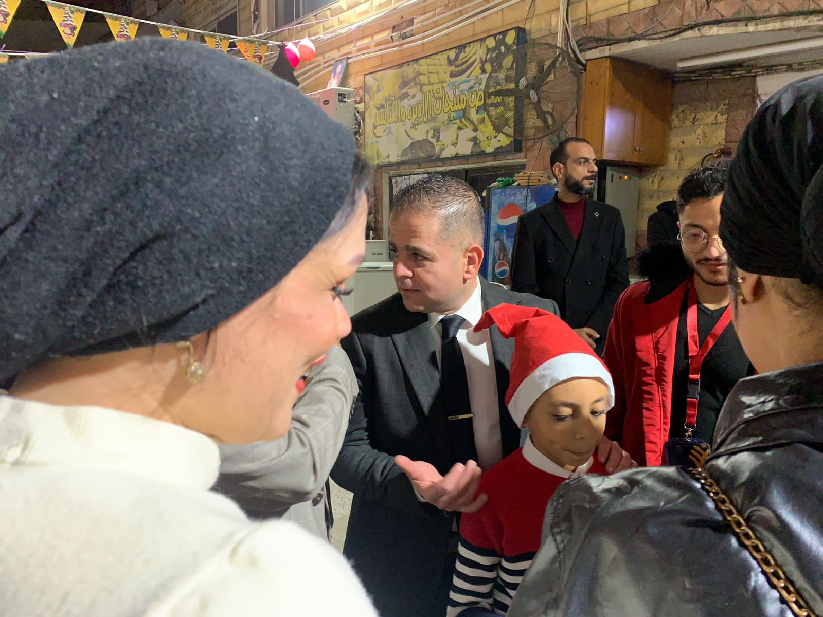 التحالف الوطني يوزع هدايا لاسعاد الصغار في عيد الميلاد ببورسعيد