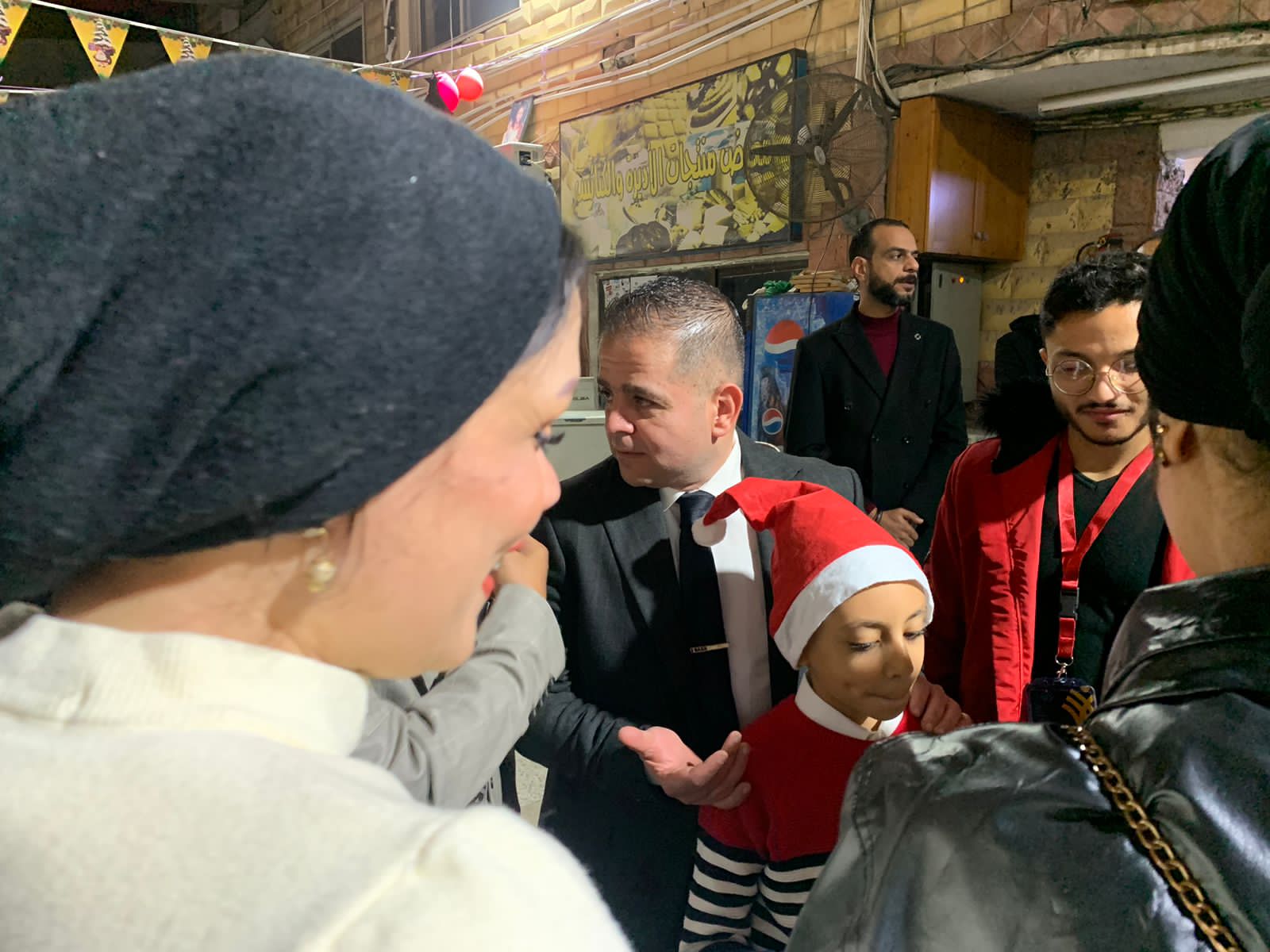 التحالف الوطني يوزع هدايا لاسعاد الصغار في عيد الميلاد ببورسعيد