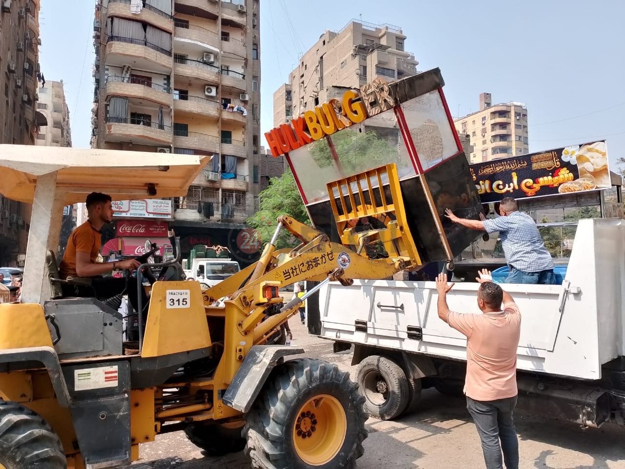 حملة حي بولاق الدكرور لإخلاء شارع العشرين 