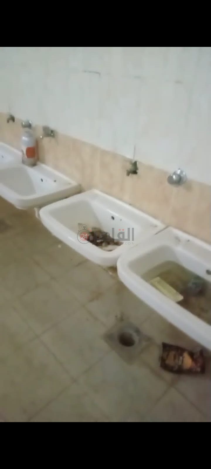 حمامات مدرسة بحدائق أكتوبر