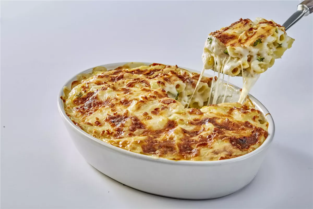 طريقة عمل مكرونة بشاميل بالدجاج خطوة خطوة