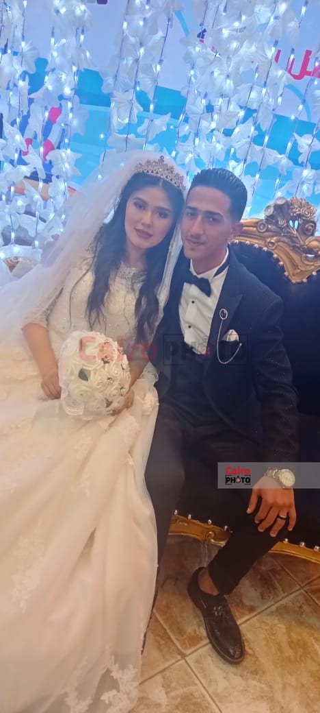 الشاب المقتول ببورسعيد وزوجته 