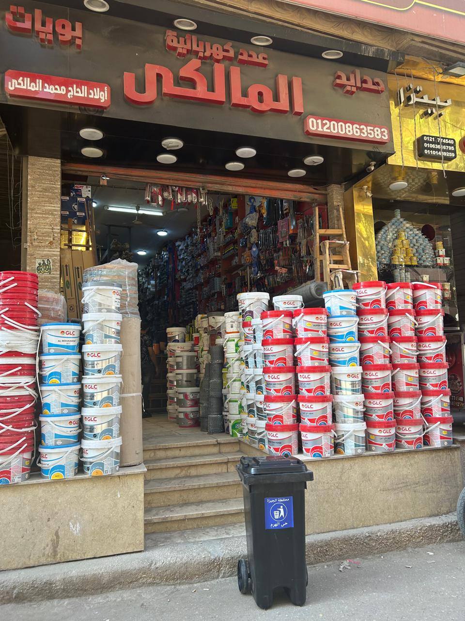 رئيس حي الهرم: إلزام أصحاب المحال التجارية والمطاعم بوضع صناديق قمامة أمامها|