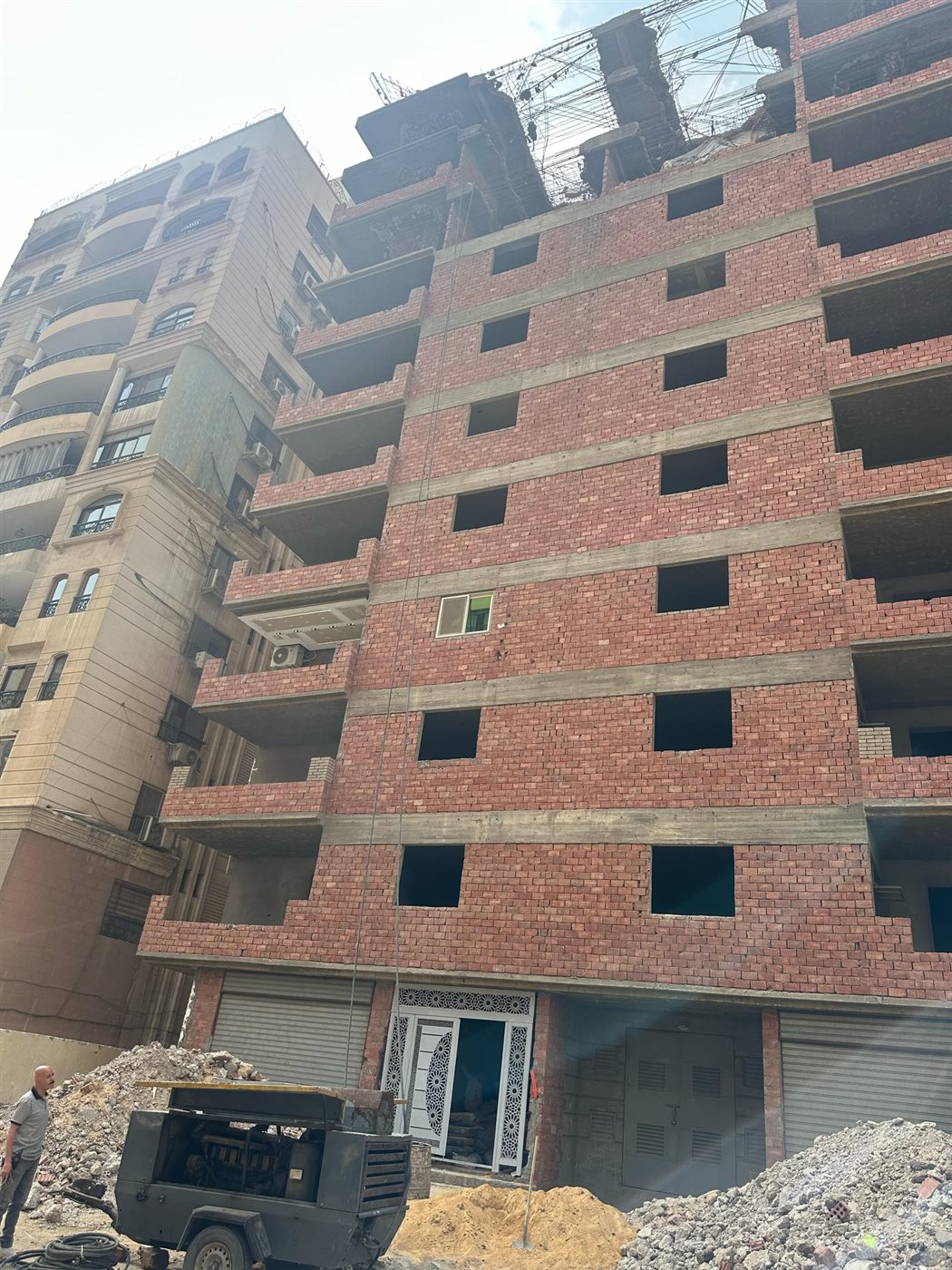 رئيس حي شرق مدينة نصر: إزالة 4 أدوار مخالفة بأحد عقارات شارع محمد كامل الحاروني| صور