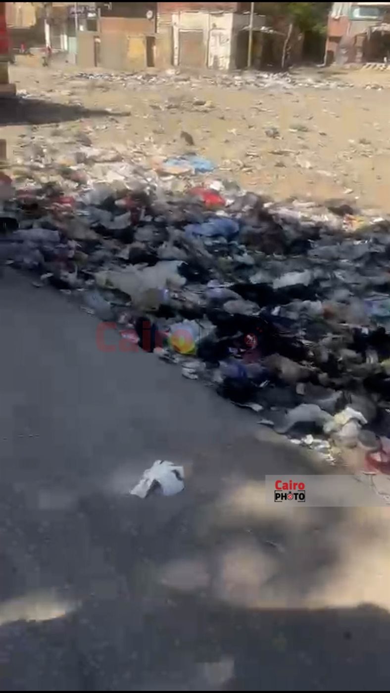 انتشار أكوام القمامة والمخلفات على امتداد 2 كم بشارع السماد بأسوان