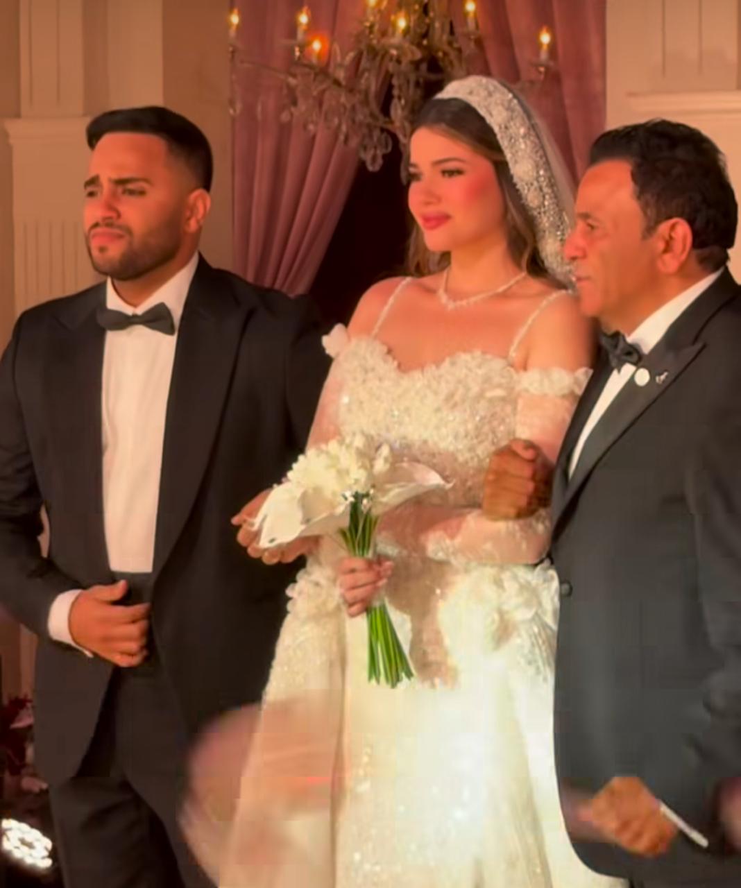 لقطات مؤثرة من حفل زفاف بسمة محمد فؤاد