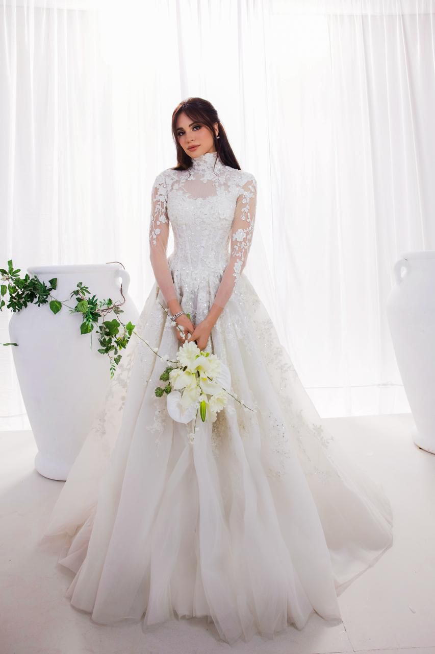 آمال ماهر تثير الجدل بعد ظهورها بـ فستان زفاف