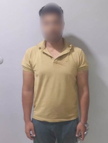 القبض على شاب هشم زجاج محل أحذية