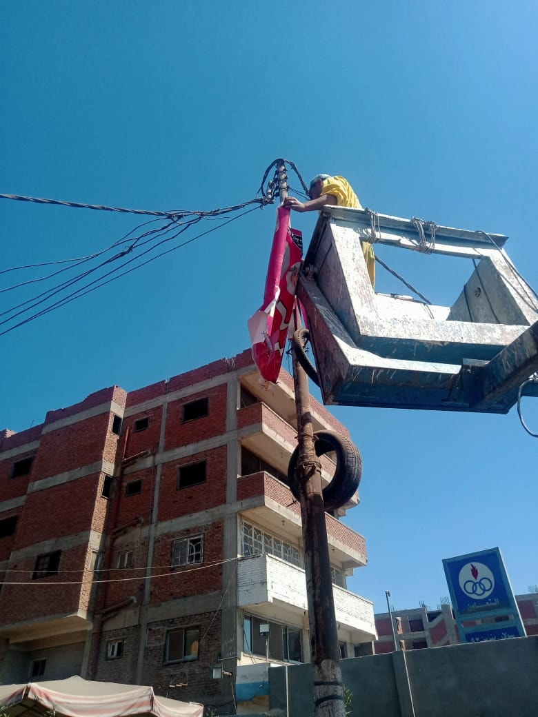 حملة لرفع الإعلانات المخالفة بالزقازيق 03