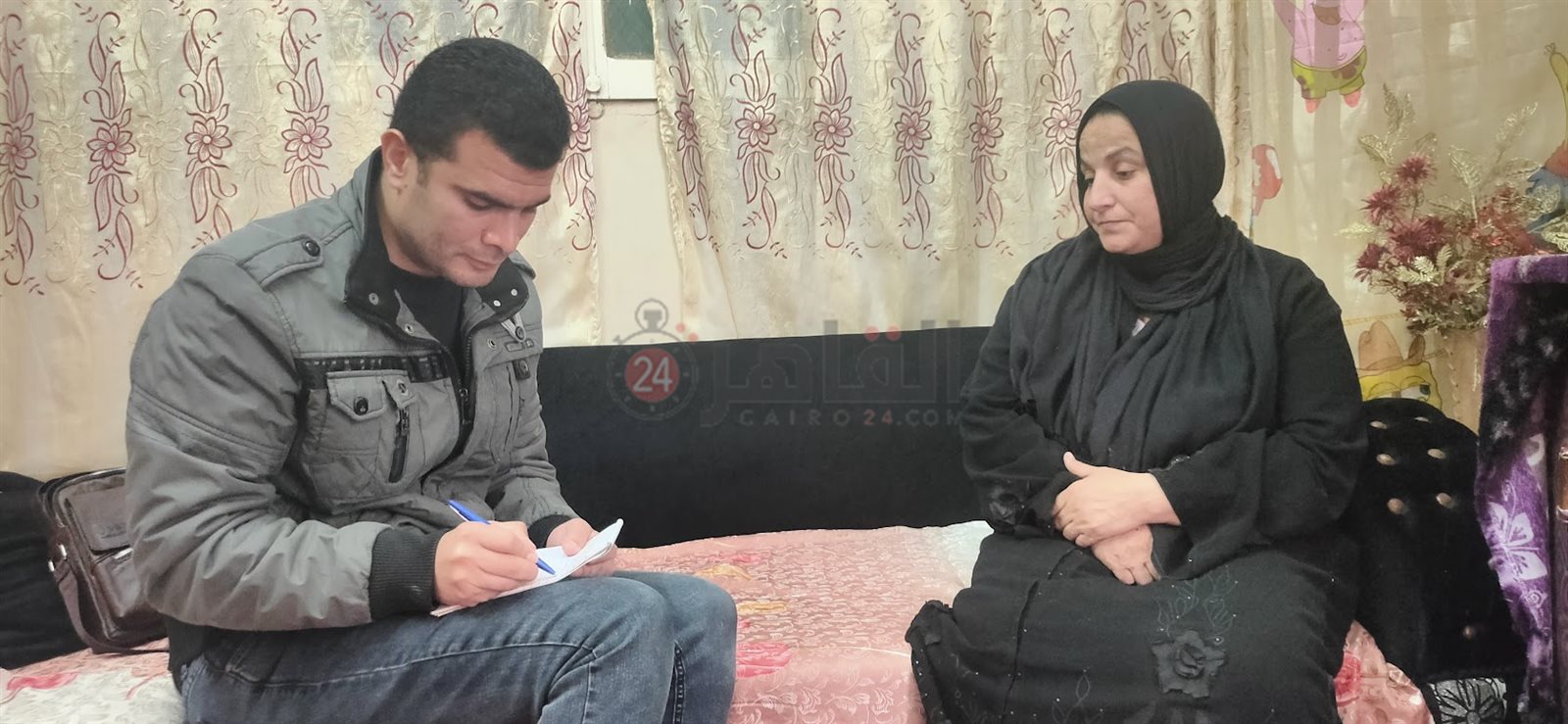 والدة المجني عليه أثناء حديثها لـ مراسل القاهرة 24