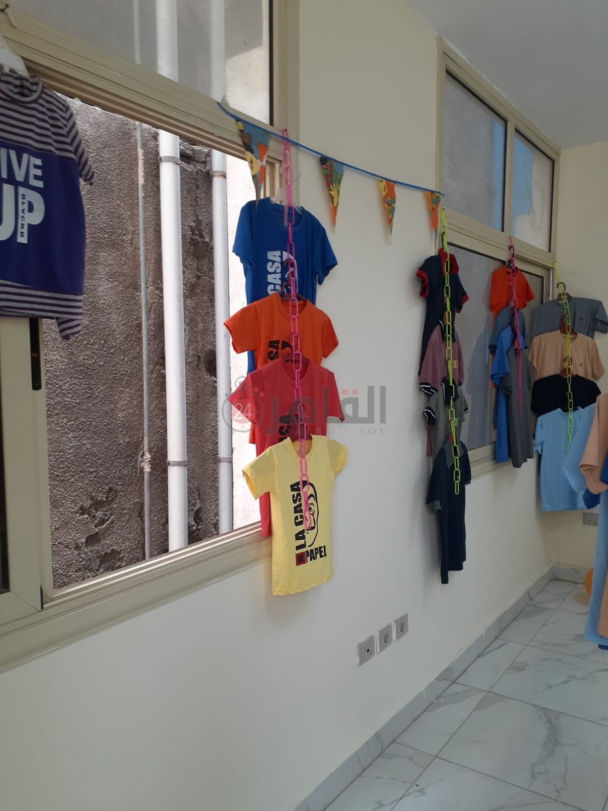 منفذ الزقازيق للملابس والأحذية 013