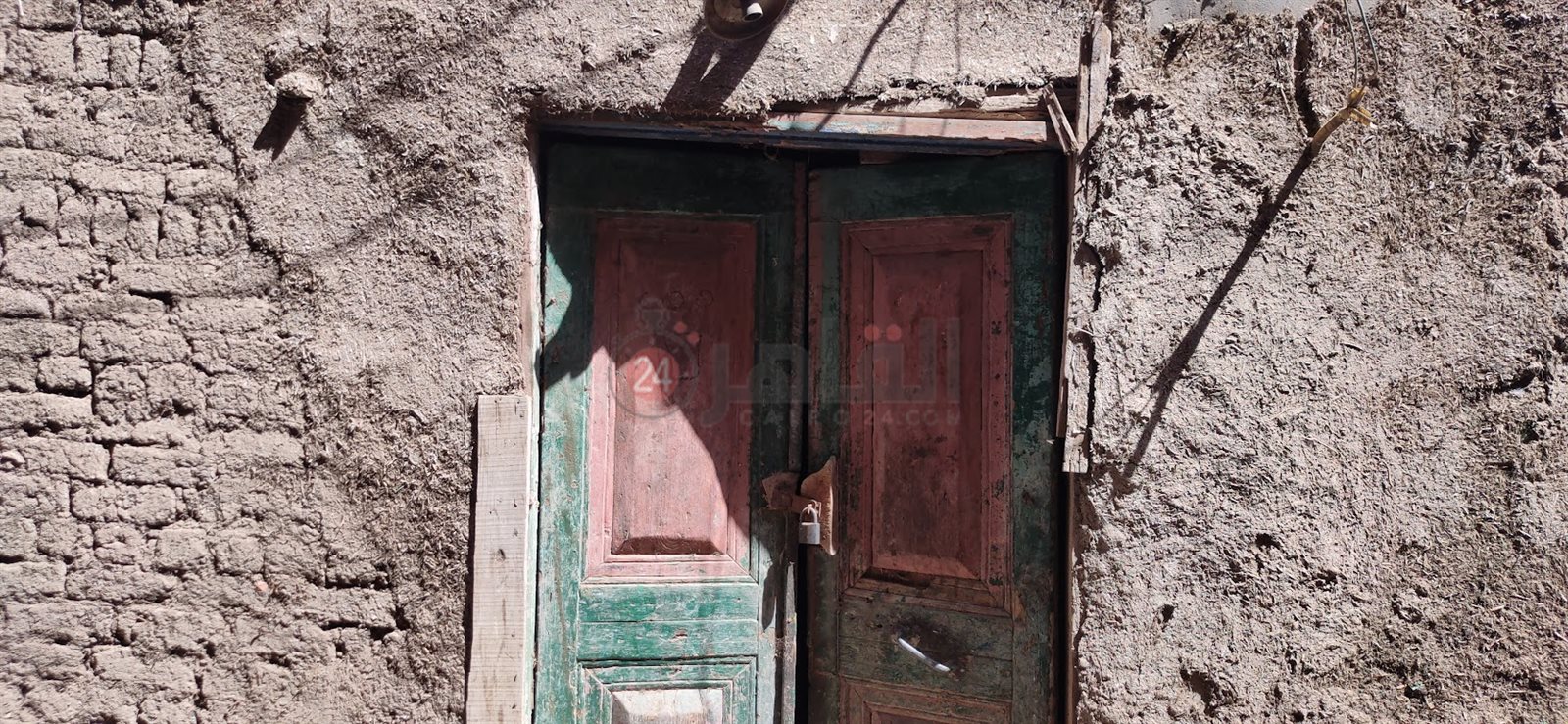 المنزل بعد انهياره 015