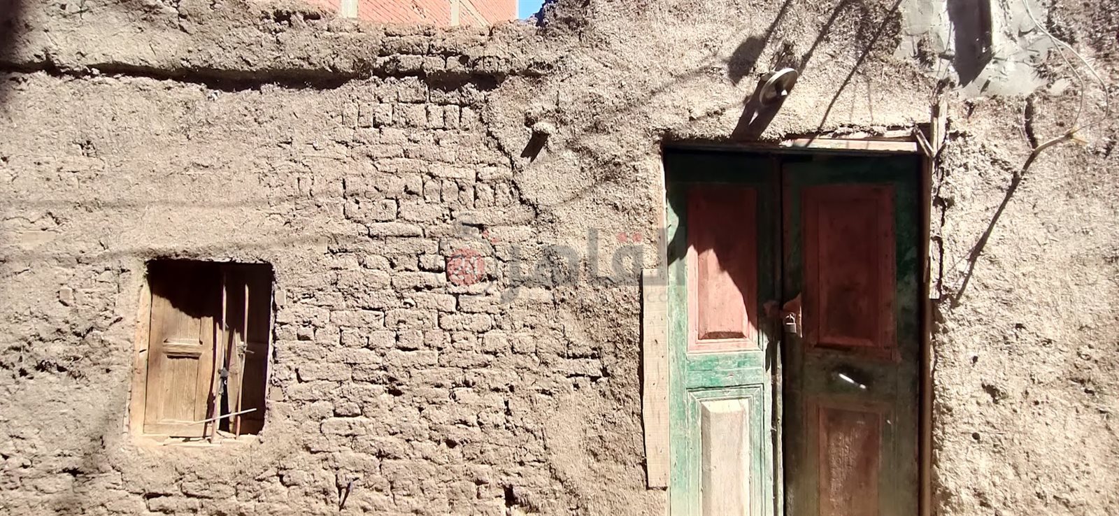 المنزل بعد انهياره 017