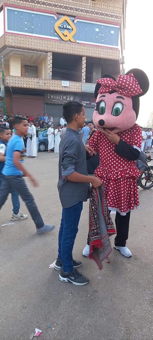 ميكي ماوس بشوارع أسيوط