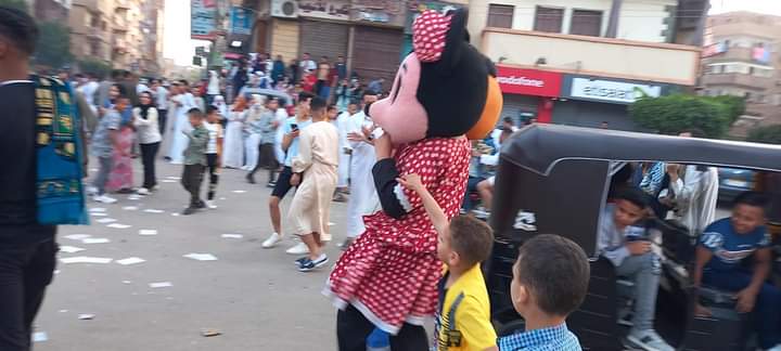 ميكي ماوس بشوارع أسيوط