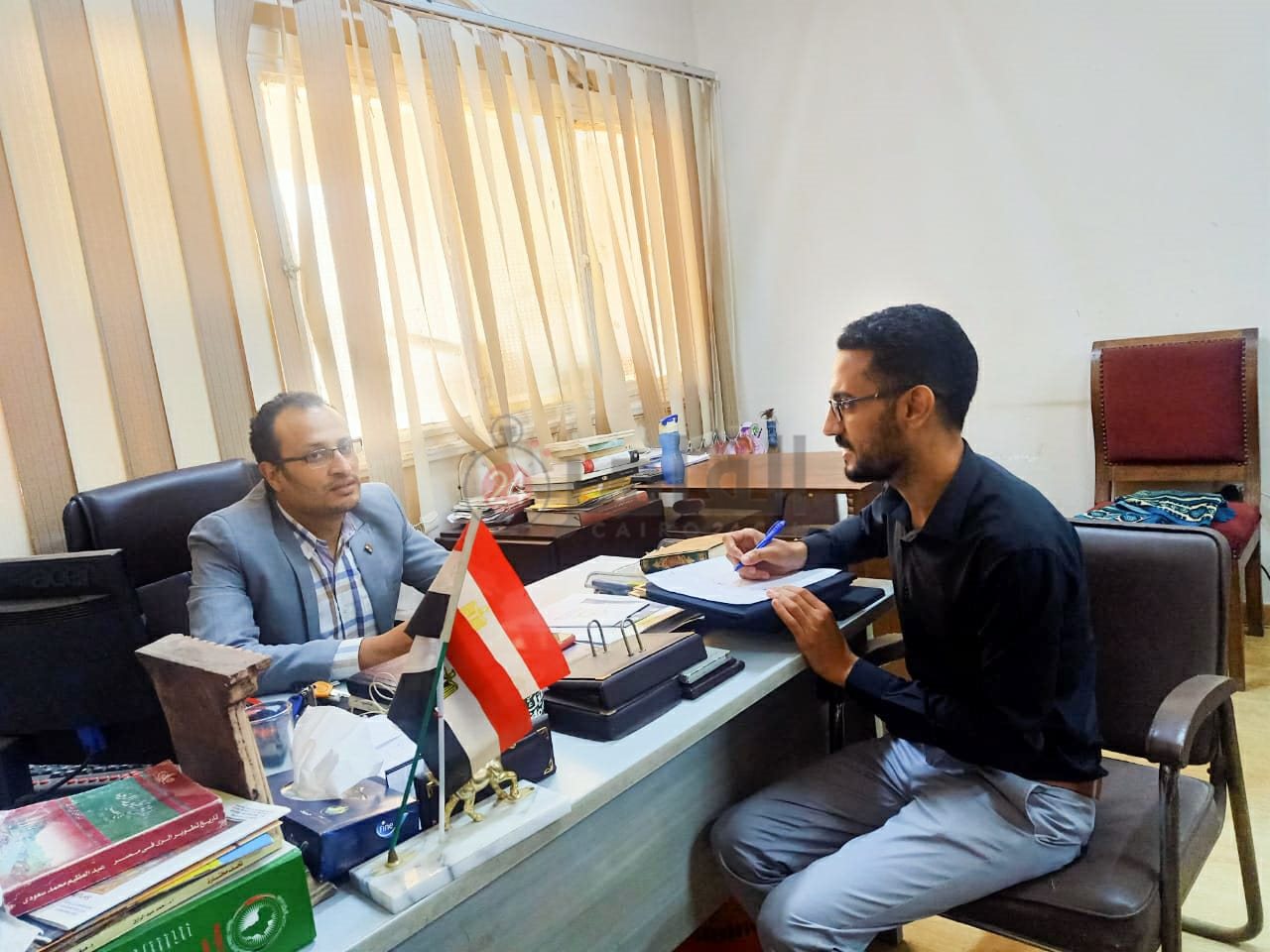 الدكتور أحمد عبدالحميد النمر ومحرر القاهرة 24