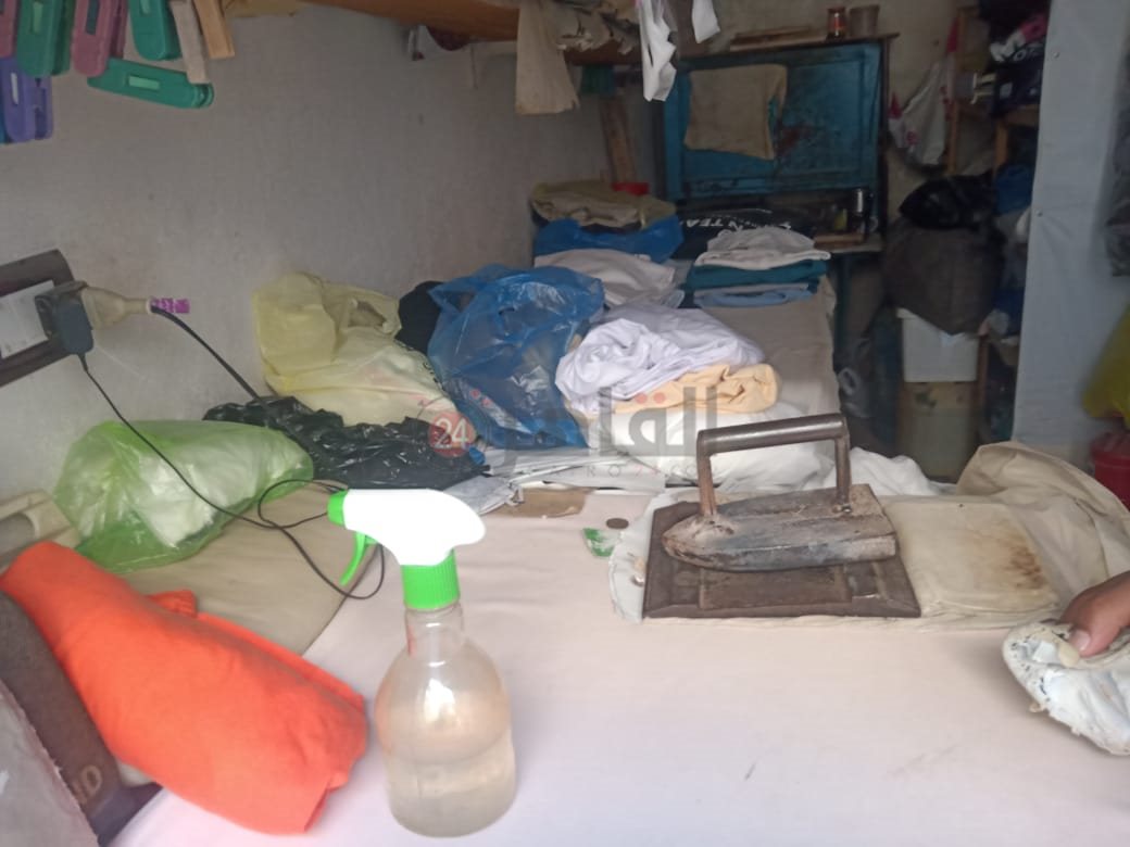 كي الملابس بالمكواة الزهر