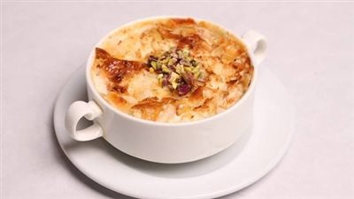 طريقة عمل أم علي زي المحلات.. جربيها بالكورن فليكس 