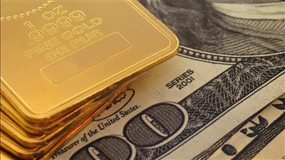 تراجع الذهب وصعود الدولار وسط ترقب قرار الفائدة الأمريكية