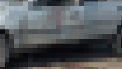 مصرع شخص في حادث تصادم سيارة ملاكي بالطريق الأوسطي | صور