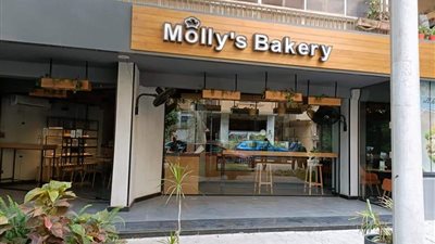 غلق وتشميع محل مخبوزات Molly's Bakery بالمعادي لإدارته دون ترخيص | صور