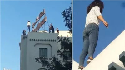 زوجة تحاول إلقاء نفسها من أعلى عقار والأهالي تتمكن من إنقاذها بالجيزة