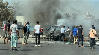 تفحم سيارة ميكروباص أعلى الطريق الدائري | صور