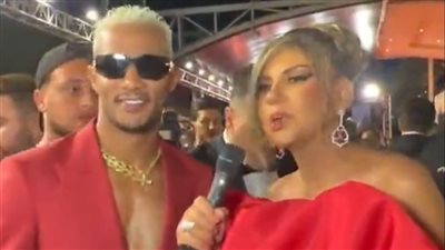 فين القميص؟.. بوسي شلبي تمازح محمد رمضان بسبب بدلته الحمراء في حفل الموريكس دور بلبنان