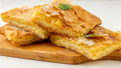 طريقة عمل صينية الجلاش الحلو بالصور.. بالكنافة والكاسترد