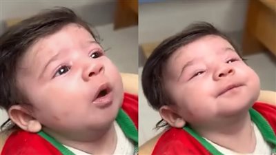 ليش يهودي يقصفه.. فلسطيني يداعب رضيعة ضحية العدوان على غزة| فيديو