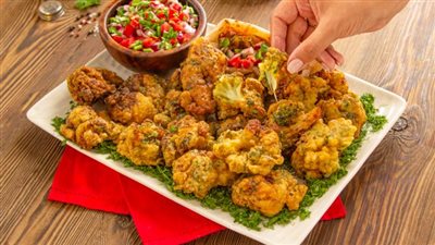 طريقة عمل القرنبيط المقلي بدون بيض.. سر القرمشة في النشا