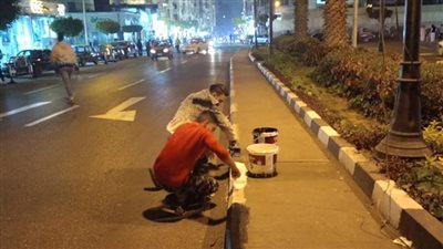 دهان وتجميل الأرصفة أمام قصر عابدين وشارع التحرير