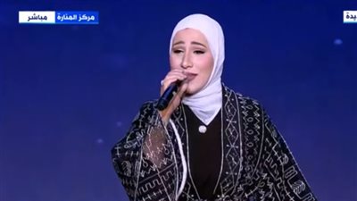 نداء شرارة تقدم ابتهالا للشيخ محمد عمران في احتفالية تكريم المرأة المصرية