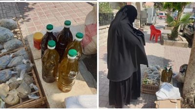 زعتر وزيت زيتون ومرمية.. فلسطينية تبيع منتجاتها بالقاهرة: زوجي مات وأعول 5 أطفال | صور