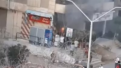 اندلاع حريق في محل تجاري بأكتوبر | صور