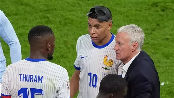 مبابي وديشامب وتورام-