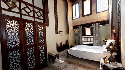 الإسكان تبدأ فرش غرف وكالة قايتباي بالجمالية بعد تحويلها لفندق سياحي