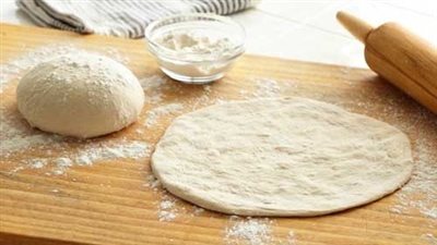 إسكندراني أصلي | طريقة عمل عجينة الحواوشي باللبن.. 9 أسرار لعجينة قطنية رائعة