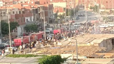 السيطرة على حريق في الحي الرابع عشر بالعاشر من رمضان | صور