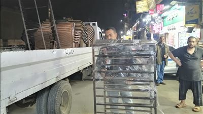 حملة مكبرة على المحال المخالفة لإزالة التعديات والإشغالات بالعمرانية في الجيزة| صور