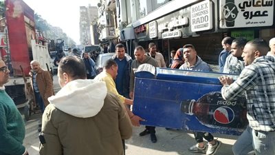 إزالة تعديات وإشغالات لمحال تجارية وباعة جائلين بفيصل والطالبية 