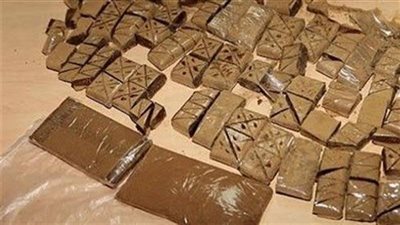 المؤبد لتاجري مخدرات لحيازتهما حشيش وأفيون وذخيرة في قنا