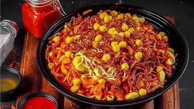 وجبة متكاملة.. طريقة تحضير كشري مصري وسلطة دقوس لإفطار اليوم 25 من رمضان 2025