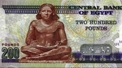 يظهر على فئة الـ 200 جنيه.. المتحف المصري بالتحرير يعرض تمثال الكاتب المصري الجالس 