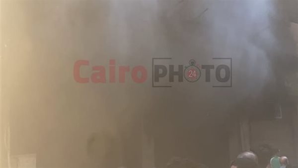 حريق محل ببرج سكني