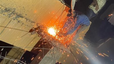 محافظة الجيزة تزيل 3 أدوار مخالفة في عقار بحي العجوزة